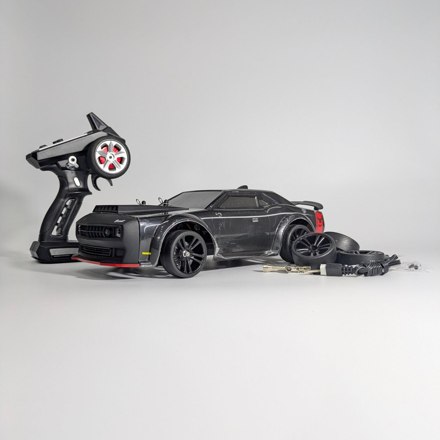 Side angle of BeingBoys Brushless Beast Black RC car India, remote controlled and high speed.