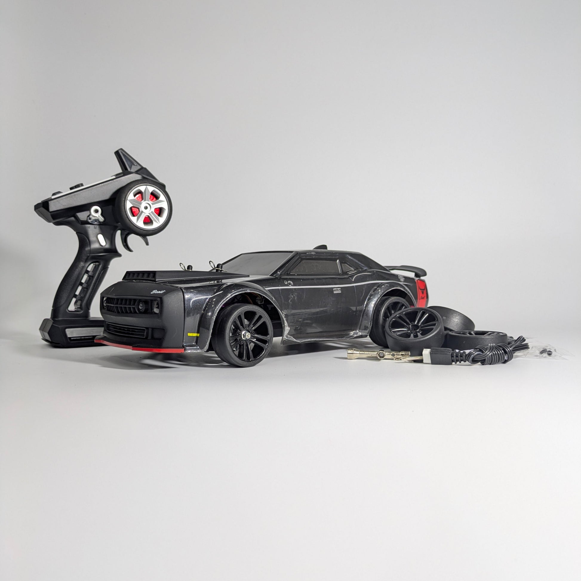 Side angle of BeingBoys Brushless Beast Black RC car India, remote controlled and high speed.